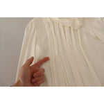 Dolce & Gabbana Off White Silk Long Sleeve Turtle Neck Top