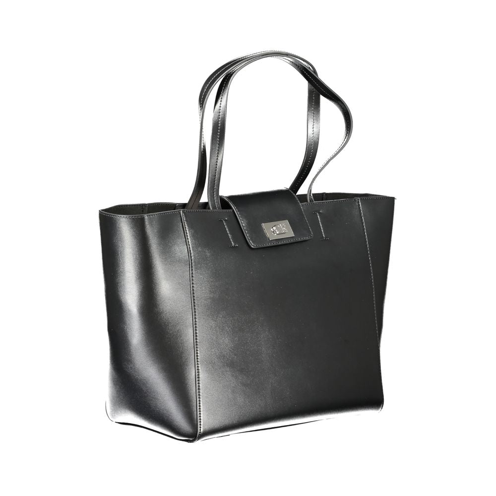 Calvin Klein Black Polyester Handbag with shoulder handles and snap closure, featuring a logo and internal pocket.