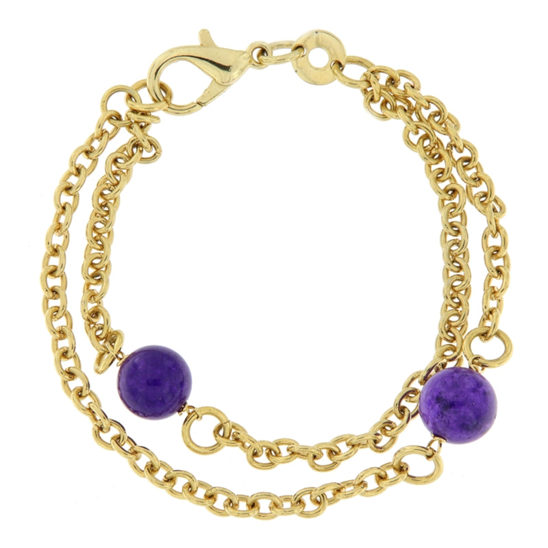 Gold chain bracelet with purple gemstone accents on white background