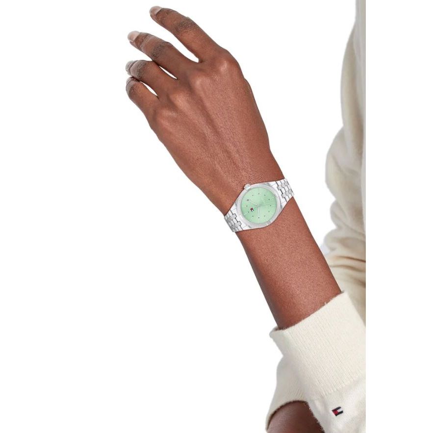 TOMMY HILFIGER Mod. 1782565 lady's watch with quartz analog movement, 34 mm case and green dial on wrist, official packaging included.