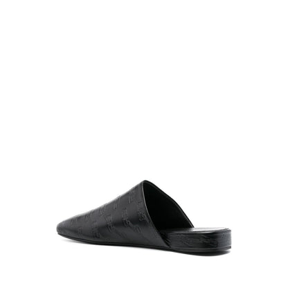 Balenciaga debossed-logo leather mules Sandals