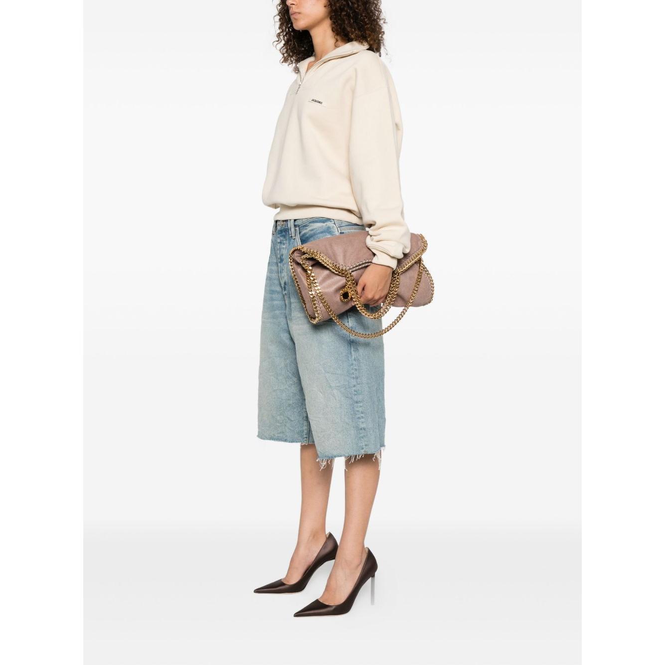 Front view with bag zipped and handles upright.