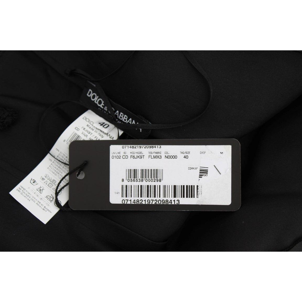 فستان دولتشي آند غابانا الأنيق باللون الأسود من الدانتيل المزهر بطول الركبة