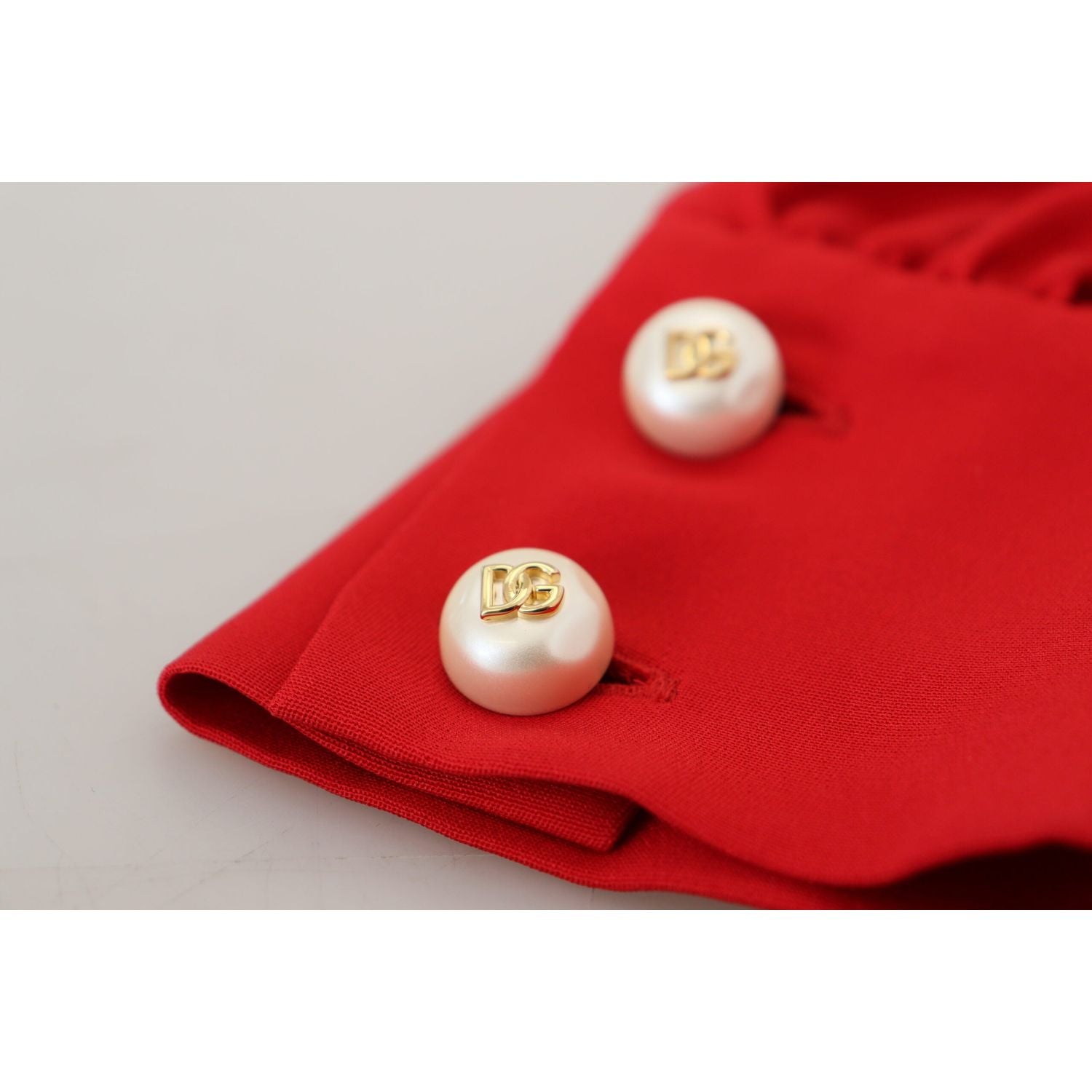 فستان دولتشي آند غابانا الأنيق من الحرير الأحمر بطول الركبة