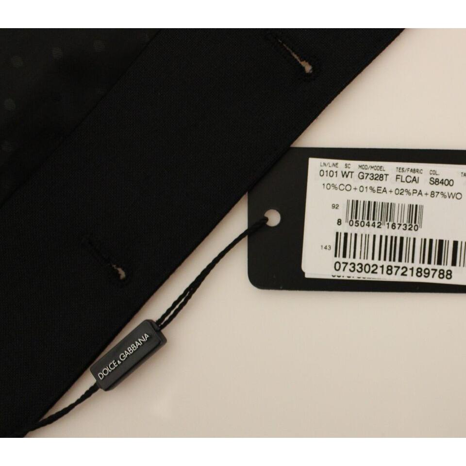 فستان دولتشي آند غابانا الأنيق المصنوع من الصوف والحرير باللون الأسود