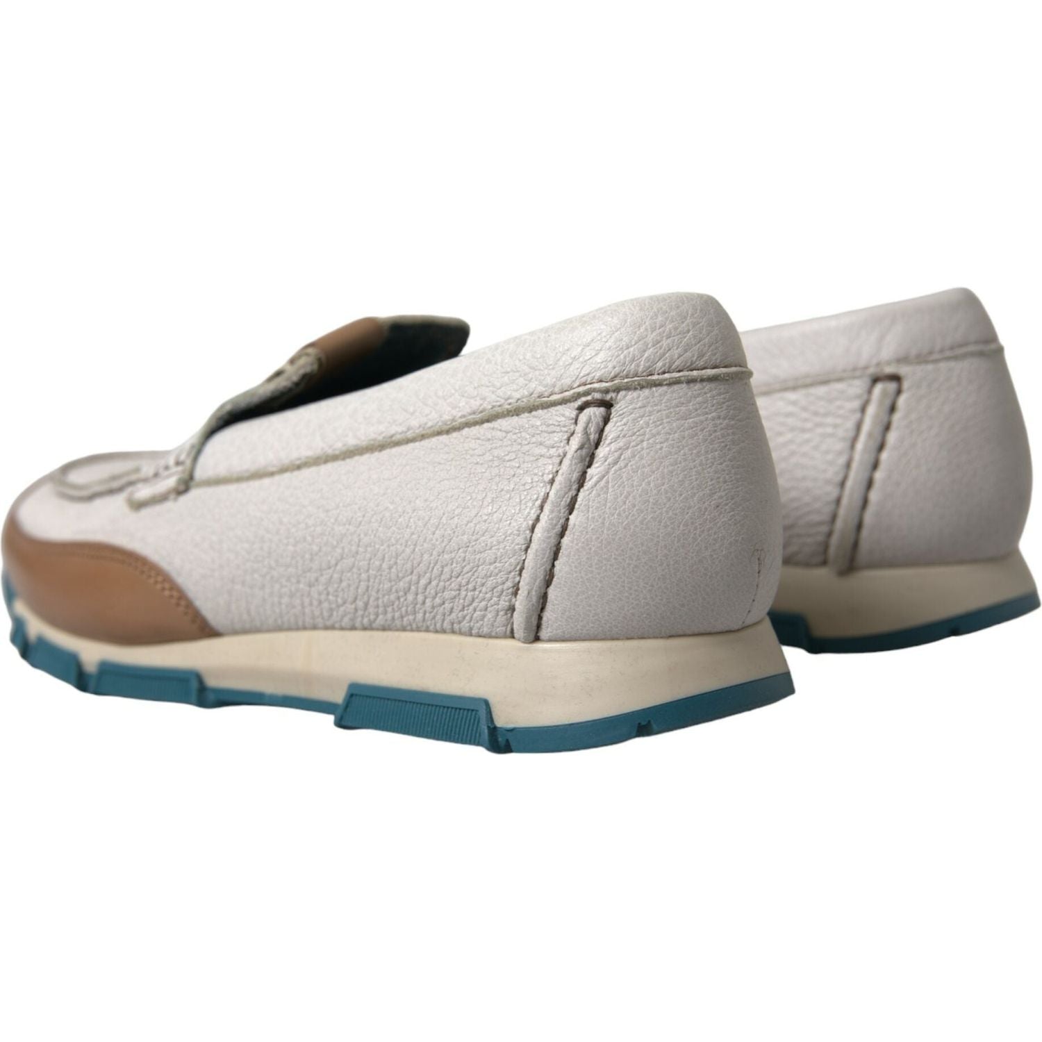 حذاء دولتشي آند غابانا الأنيق المصنوع من جلد الغزال باللون الأبيض