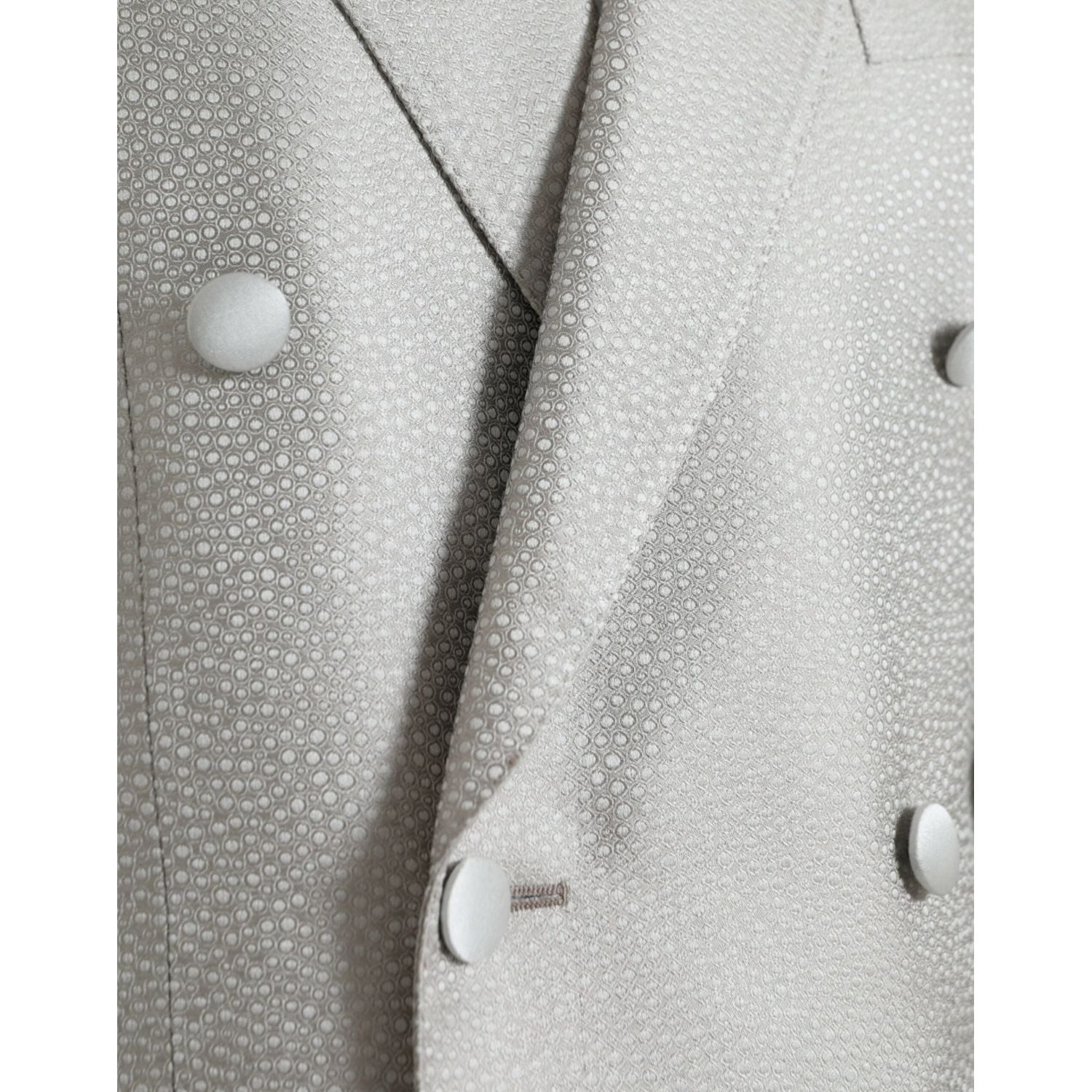 سترة مارتيني مزدوجة الصدر من دولتشي آند غابانا باللون الأبيض الفاتح