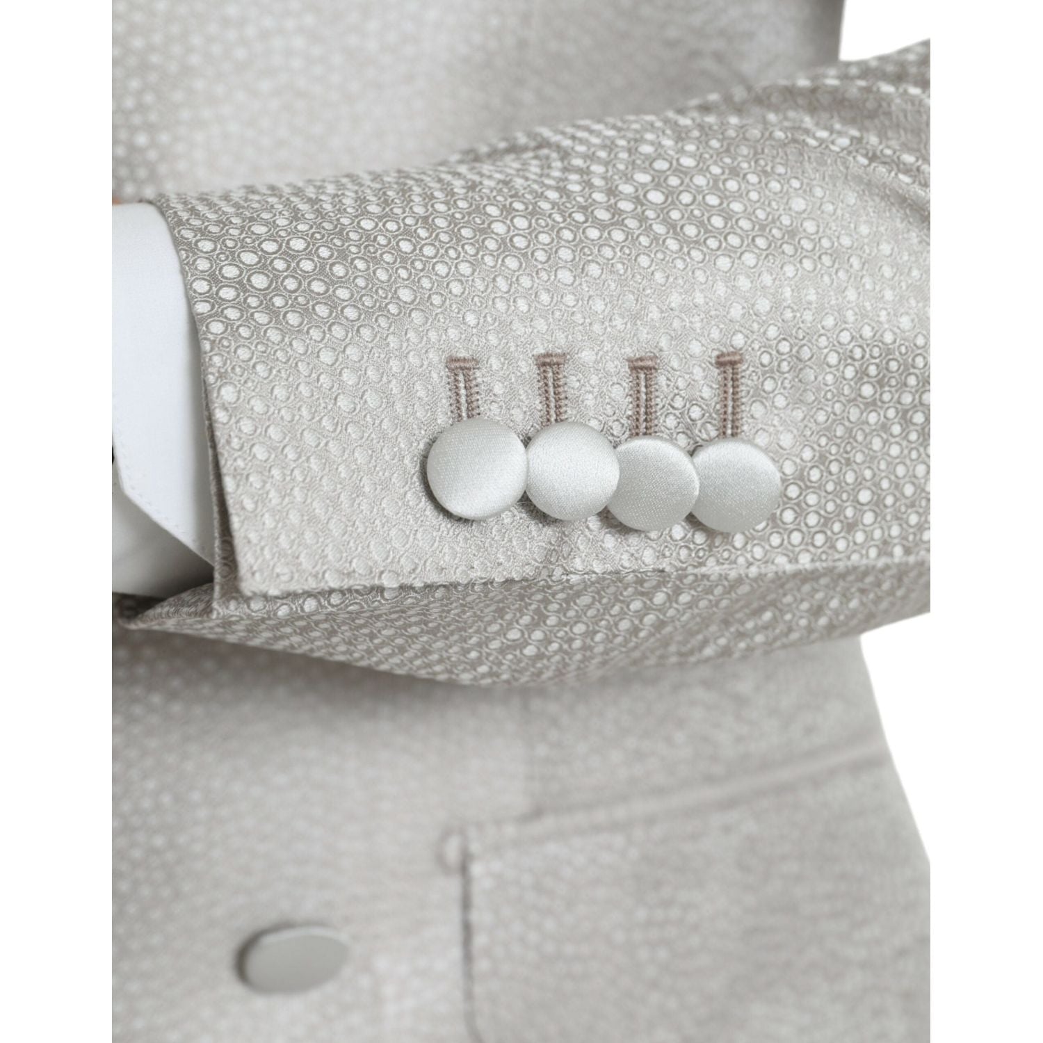 سترة مارتيني مزدوجة الصدر من دولتشي آند غابانا باللون الأبيض الفاتح