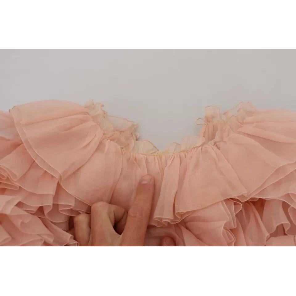 سترة دولتشي آند غابانا الوردية ذات الكشكشة والأكمام الطويلة