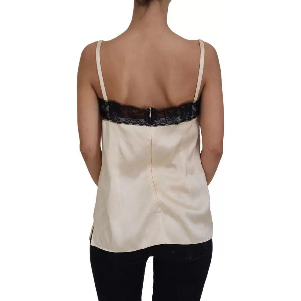 بلوزة من الدانتيل البيج مع شعار السباغيتي من دولتشي آند غابانا