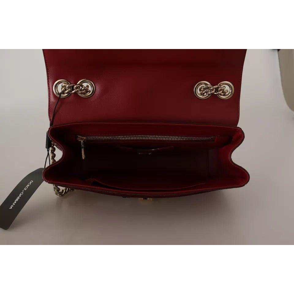 حقيبة LUCIA من دولتشي آند غابانا مصنوعة من جلود غريبة باللون الوردي والأحمر وسلسلة ذهبية
