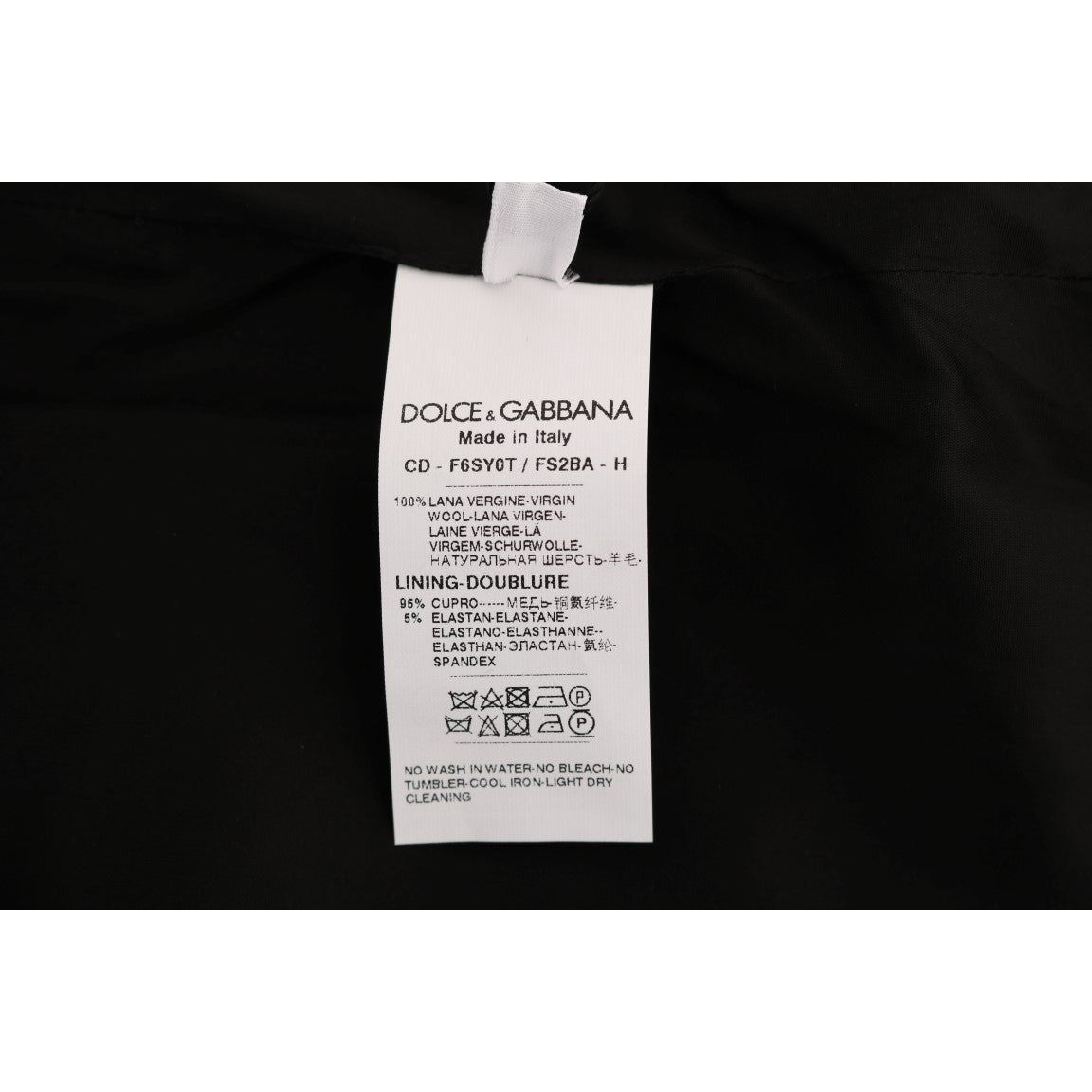 فستان دولتشي آند غابانا الأنيق المصنوع من الصوف بدون أكمام ومنقط بالبولكا