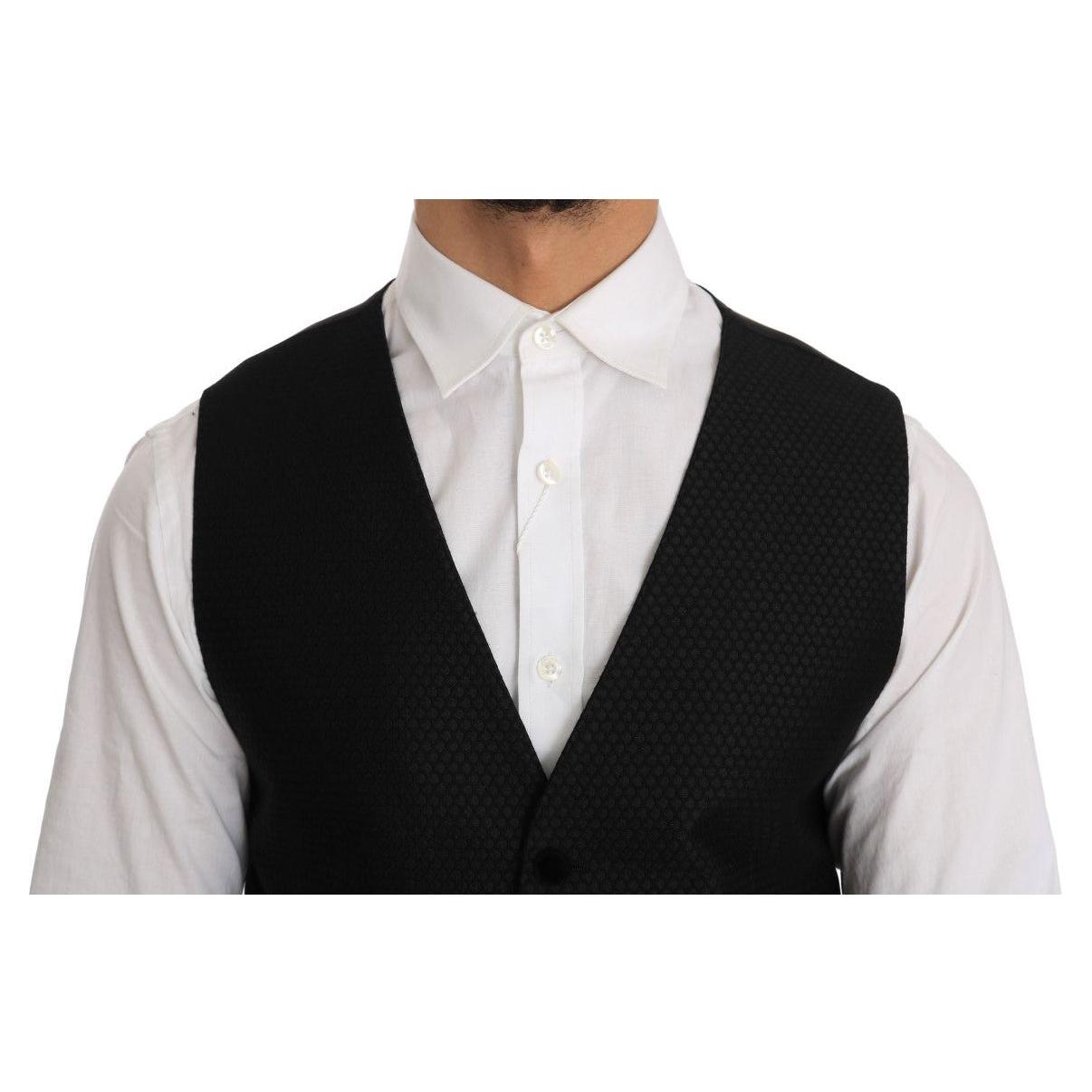 فستان أسود أنيق منقط من دولتشي آند غابانا