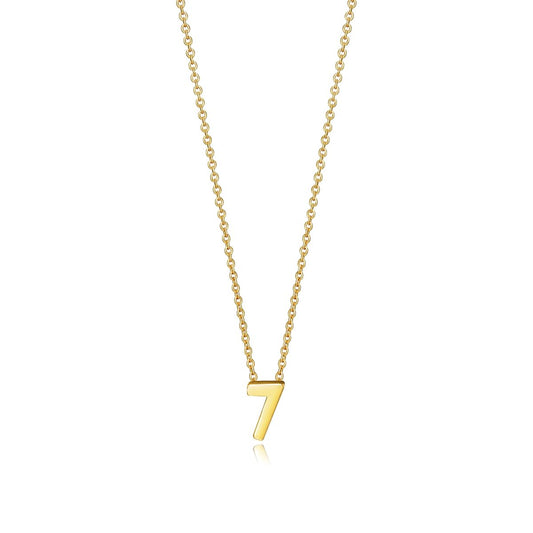 Gold necklace with numeral '7' pendant, elegant design.