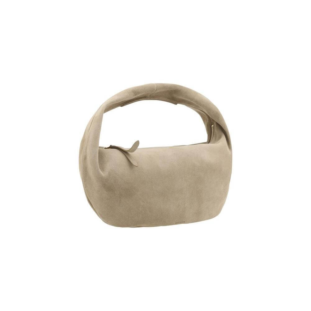 Front view with bag zipped and handles upright.