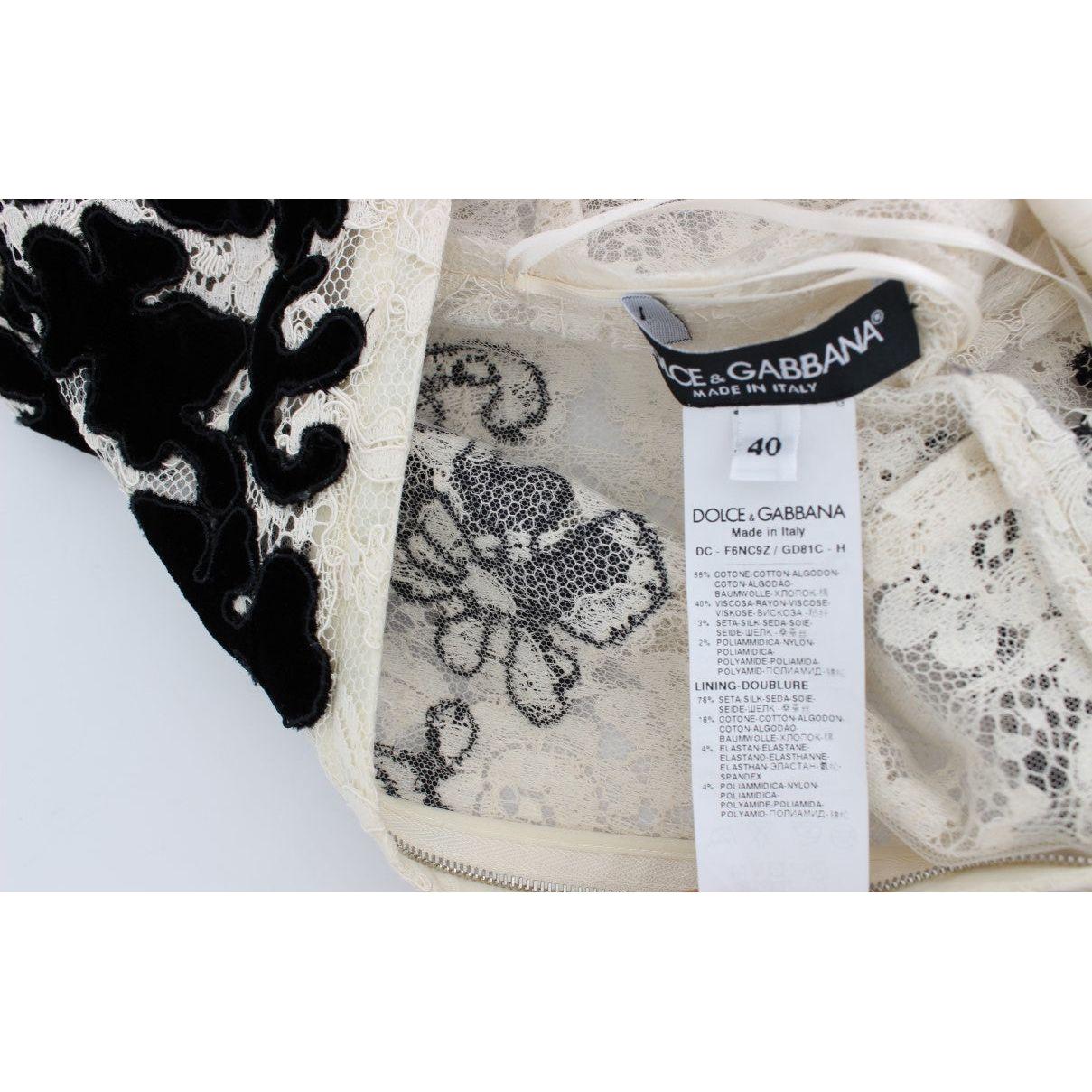 فستان ماكسي أنيق من دولتشي آند غابانا بأكمام قصيرة ومزين بالدانتيل