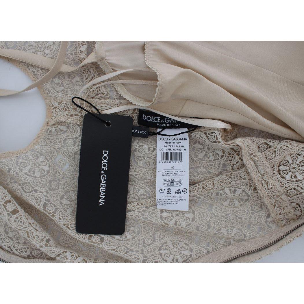 فستان ماكسي أنيق باللون البيج من دولتشي آند غابانا مع فتحة زهور