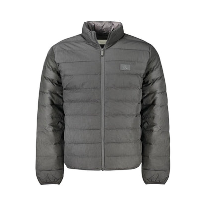 Calvin Klein Black Polyamide Men Jacket with sleek design and discreet logo, crafted from 95% recycled nylon for durability and comfort.