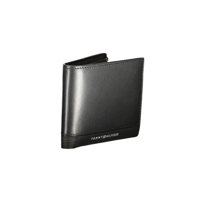 Tommy Hilfiger Black Leather Men Wallet with compartments and card slots, featuring iconic logo for stylish everyday use.