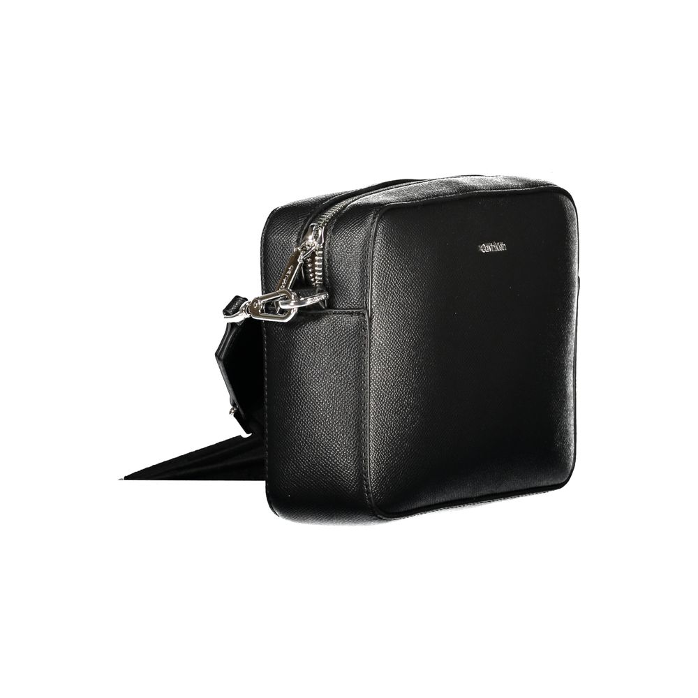 Calvin Klein Black Polyethylene Women Handbag with adjustable strap and zip closure displayed on white background.