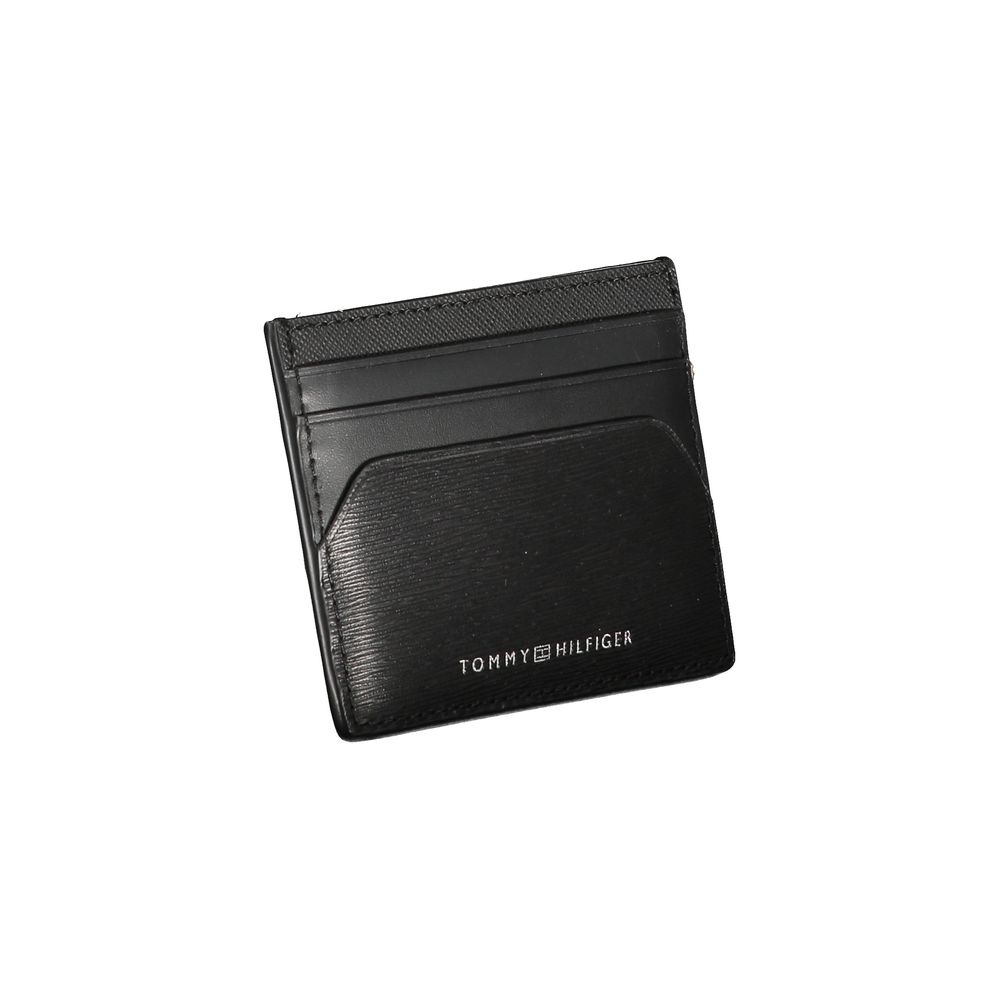 Tommy Hilfiger Black Leather Wallet with card holder and central pocket, featuring logo design.