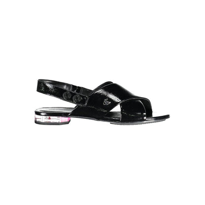 Calvin Klein Black Leather Women Sandal with elegant crossed front and subtle 1cm heel, perfect for minimalist chic fashion.