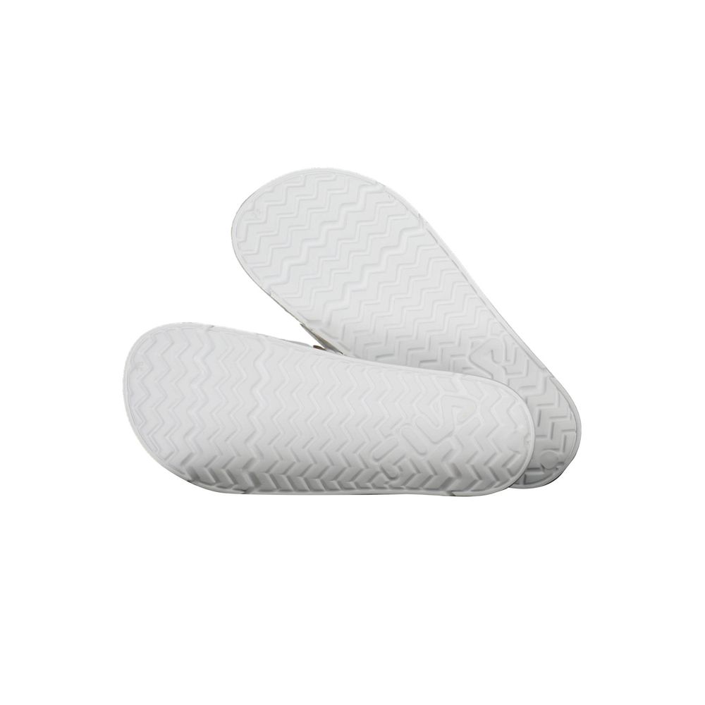 Sole view of Fila White Polyethylene Women Sandal showing textured pattern for grip and support, emphasizing durability and style.