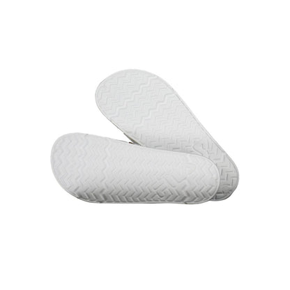 Sole view of Fila White Polyethylene Women Sandal showing textured pattern for grip and support, emphasizing durability and style.