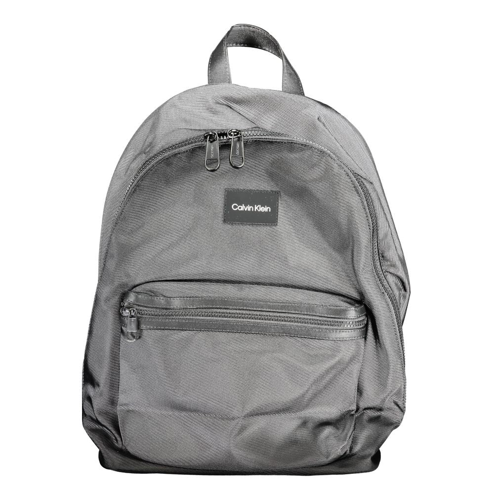 Calvin Klein Black Polyester Backpack with handle, adjustable straps, multiple pockets, water-repellent, zip closure.