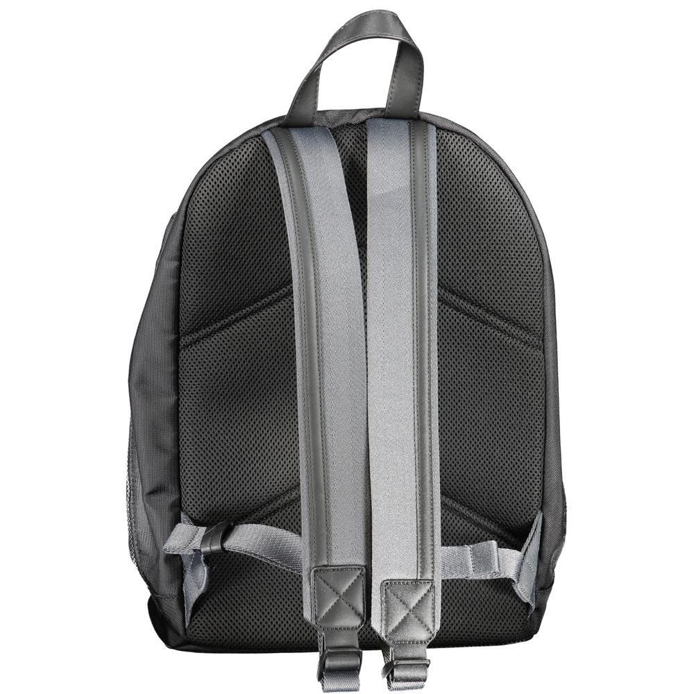 Back view of the Calvin Klein Black Polyester Backpack showing adjustable straps and handle.