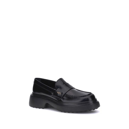 Tod's Black Rubber Platform Loafers with rubber sole and logo plaque, made in Italy, featuring calf leather upper.