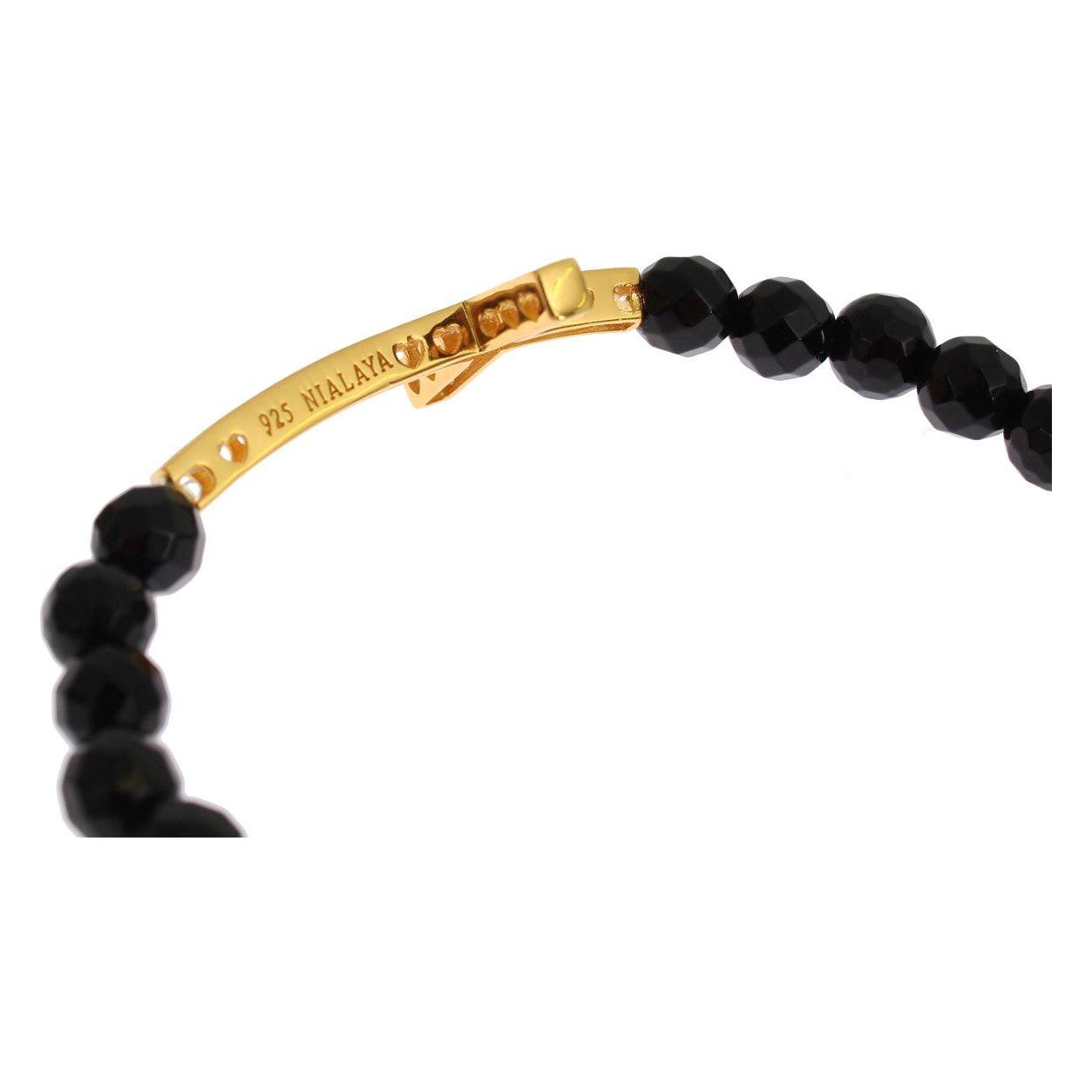 سوار نيالايا مطلي بالذهب الإسترليني مع صليب من الألماس