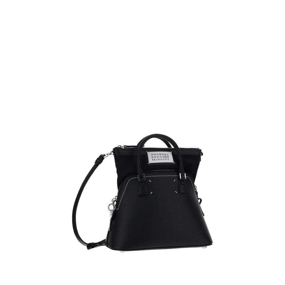 Front view with bag zipped and handles upright.