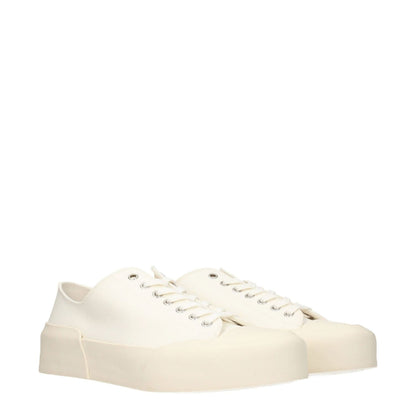 Jil Sander Beige Fabric Low Top Sneakers with lace-up closure, back logo, and rubber sole, offering a sporty glam look.