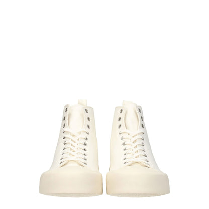 Jil Sander Beige Fabric High Top Sneakers with ivory accents, lace-up closure, and rubber sole, sporty glam style with mid heels.