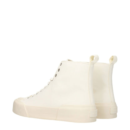 Jil Sander Beige Fabric High Top Sneakers with round toe, lace-up closure, rubber sole, and mid heels in ivory color, sports glam style.
