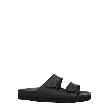 Palm Angels Black Leather Flat Sandals with front logo and strap closure, rubber sole, and low, flat heel.