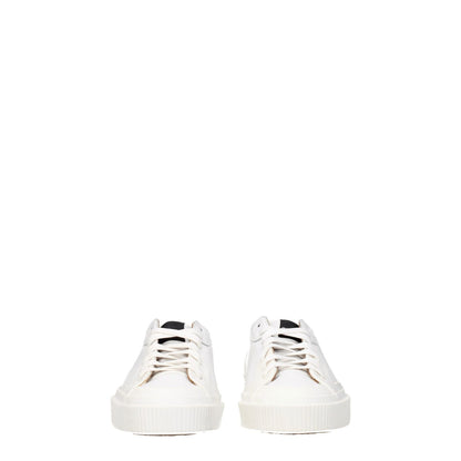 Givenchy White Leather Low Top Sneakers with lace-up closure and rubber sole, featuring logos on front, side, and back views.