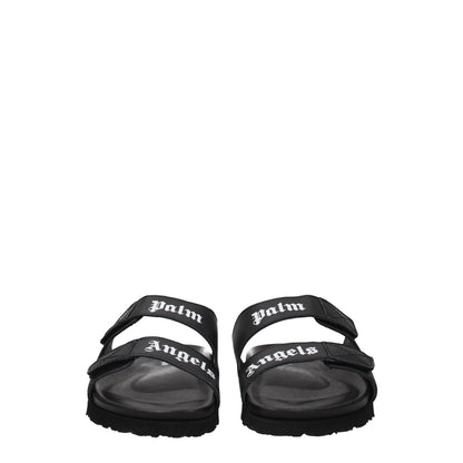 Palm Angels Black Leather Slippers with strap closure and front logo design, featuring open toe and flat heel made from rubber sole.