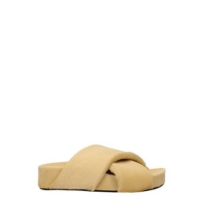 Jil Sander Beige Horsehair Slippers in pony skin with open toe design and leather sole. Casual style with low flat heel.