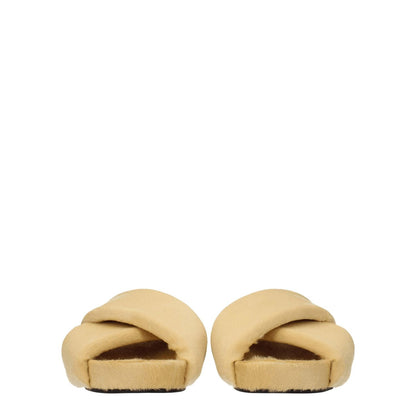 Jil Sander Beige Horsehair Slippers featuring pony skin, low flat heel, leather sole, and open toe design with vintage effect.