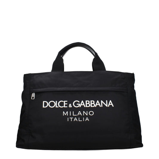Dolce & Gabbana Black Fabric Luggage And Travel bag with front logo and zip closure, featuring adjustable and removable shoulder strap.