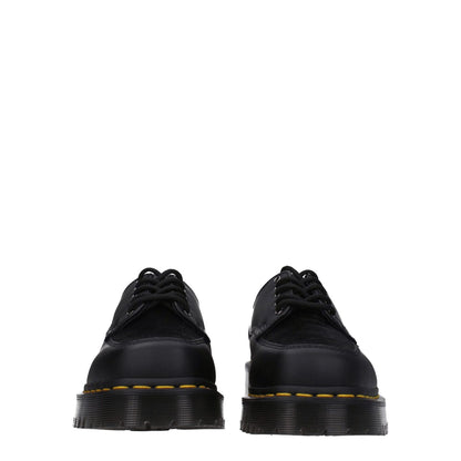 Dr. Martens Black Leather Oxfords And Derbies, casual style, square toe, rubber sole, lace up closure, side view.