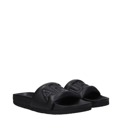 Ambush Black Leather Slippers with front logo, open toe design, rubber sole, street style fashion footwear.