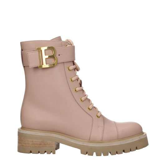 Balmain Beige Leather Ankle Boots with side logo, lace-up closure, mid heels, round toe, and rubber sole. Sporty glam style footwear.