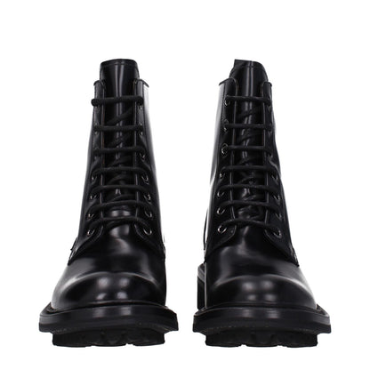 Church's Black Leather Ankle Boots with lace-up closure and low flat heel, featuring a vintage effect and rubber sole.
