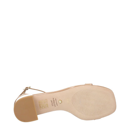 Underside view of Stuart Weitzman Pink Leather Flat Sandals showcasing leather sole and buckle closure.