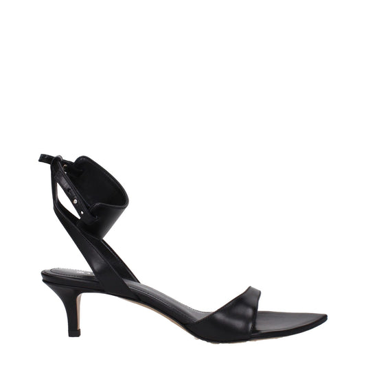 Isabel Marant Black Leather Sandals with buckle closure, open toe design, and mid heels, perfect for elegant occasions.