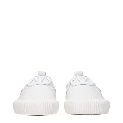 Front view of Valentino Garavani White Leather Slip-On Loafers with logo, low flat heel, and round toe.