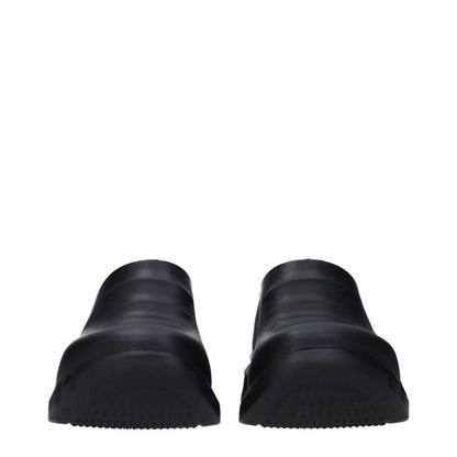 Front view of Givenchy Black Cotton Slippers with rubber sole and wedge heel, featuring side and back logos, round toe design.